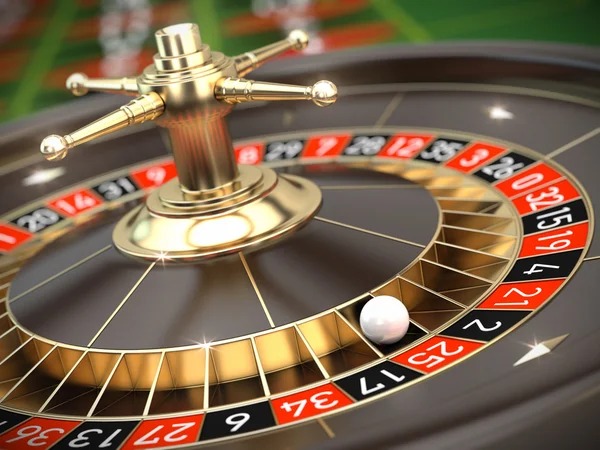 AduQ betting interface on mobile phone showing hand cards and action buttons